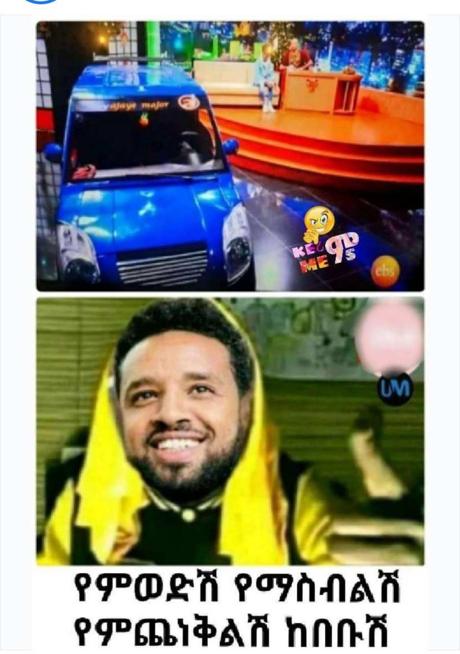 a man in a yellow jacket is smiling and holding a balloon